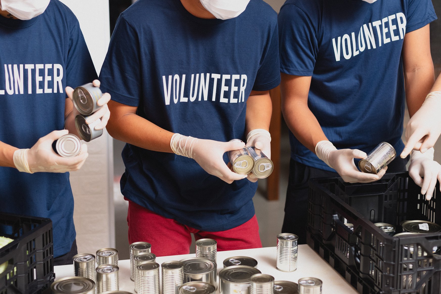 Volunteers Checking Crates of Food